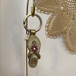 Coach Gold Sandal Keychain with Pink Flower